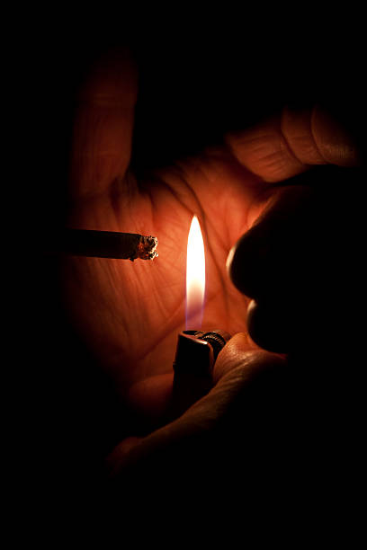 Smoking a cigarette stock photo