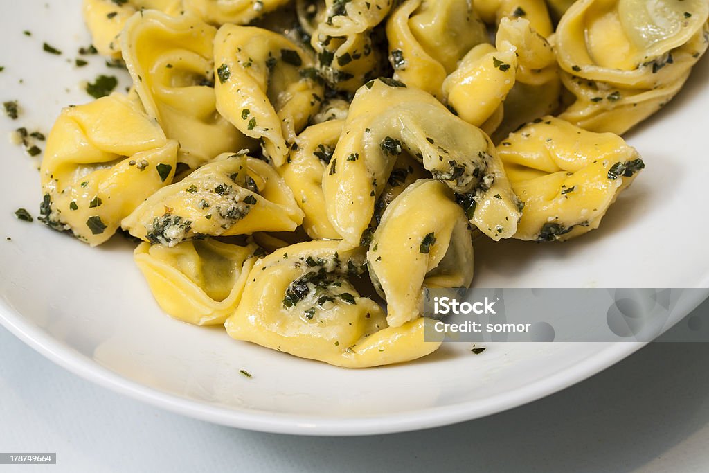 Tortellini Image of tortellini al pesto Cooking Stock Photo