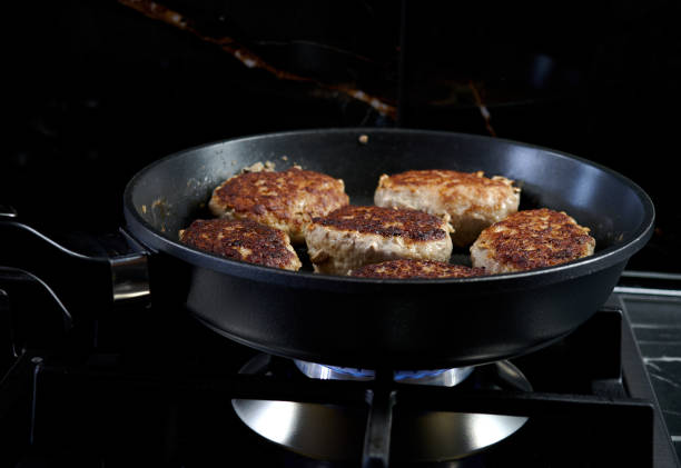 meat cutlets fried in a frying pan