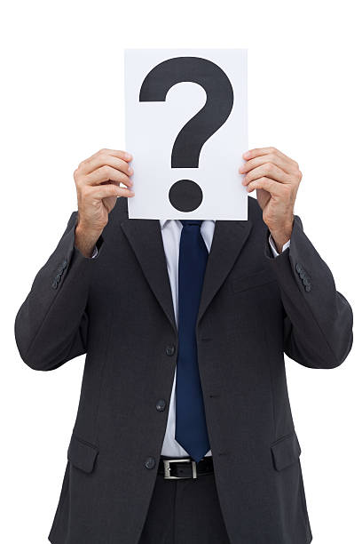 istock Businessman holding a question mark paper 178750367