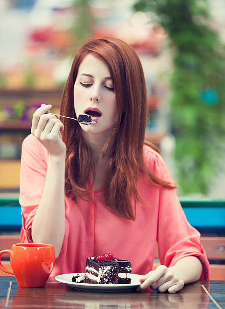 istock Style redhead girl with cake and cup 178750670