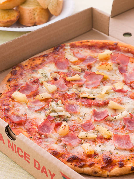 istock Hawaiian Pizza In A Take Away Box With Garlic Bread 178751107