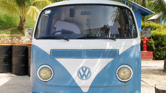 Batam, Indonesia - November 1, 2023: 1973 VW white blue Volkswagen Vans front view.