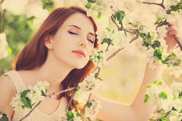 istock Girl near blossom tree 178751906