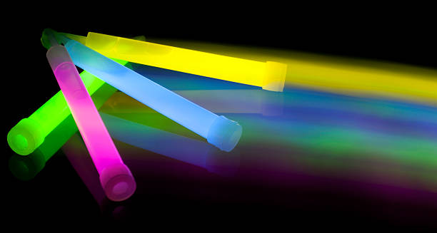 Glow sticks Glow sticks with movement,long time exposure glow stick stock pictures, royalty-free photos & images