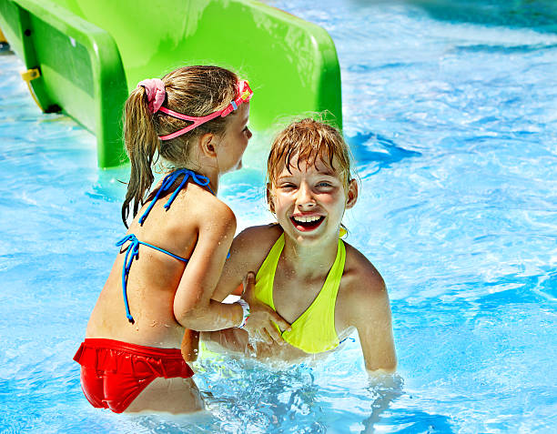 istock Children on water slide at aquapark. 178752661