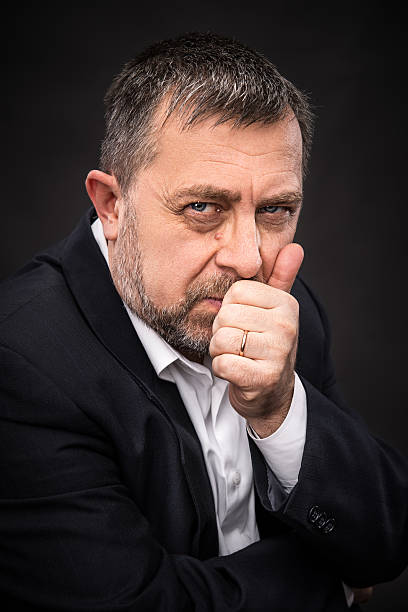istock senior man prop up the head with his fist 178752969