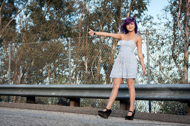 Happy Young Woman at Country Road far from City