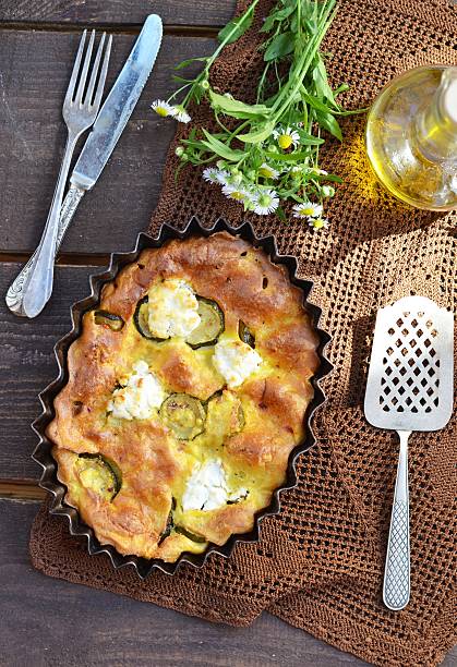 clafoutis clafoutis with   zucchini and goat cheese clafoutis stock pictures, royalty-free photos & images