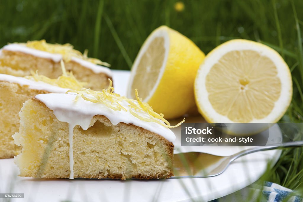 pieces of lemon cake fresh summer lemon cake on a white plate Lemon Cake Stock Photo