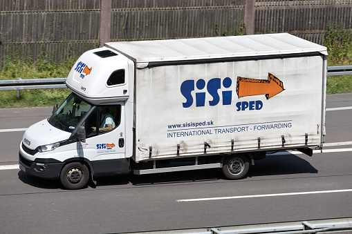 Wiehl, Germany - June 24, 2019: Sisi Sped Iveco Daily van on motorway