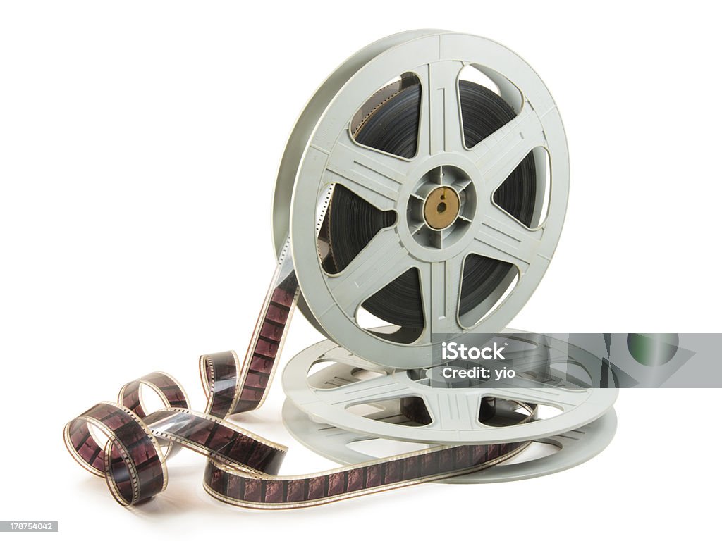 35mm Film In Two Reels A 35mm film in two reels, isolated over white, with clipping path Film Reel Stock Photo