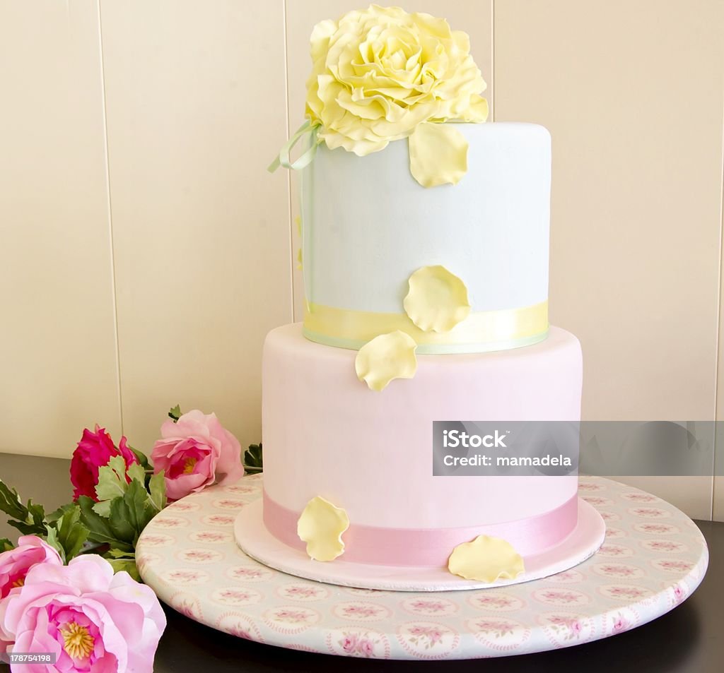 Wedding Cake Color wedding cake with yellow flower Baked Pastry Item Stock Photo