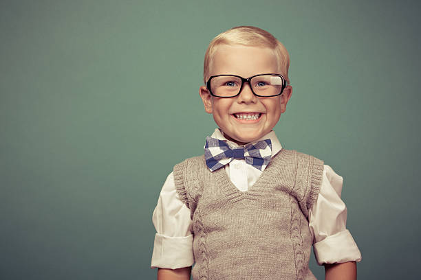 istock A portrait of a Small smartly dressed boy with glasses  178754404
