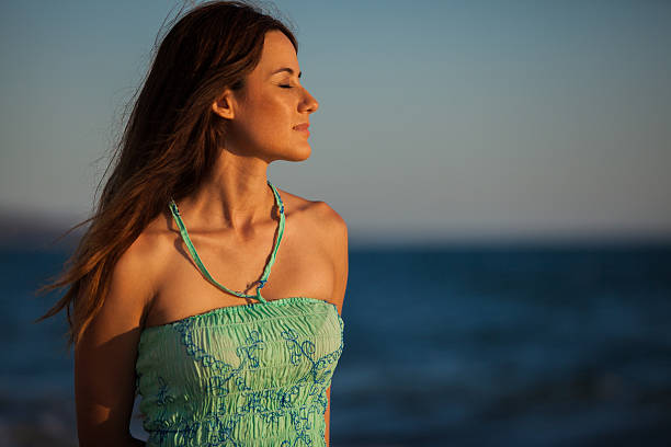 istock Beautiful woman enjoying the beach 178754666