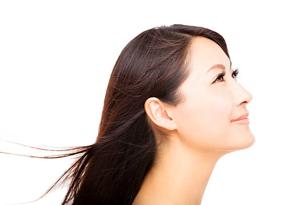 istock smiling young Woman face with hair 178754743