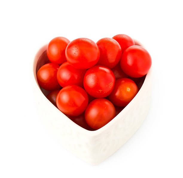 istock fresh tomatos in a heart shape 178755179