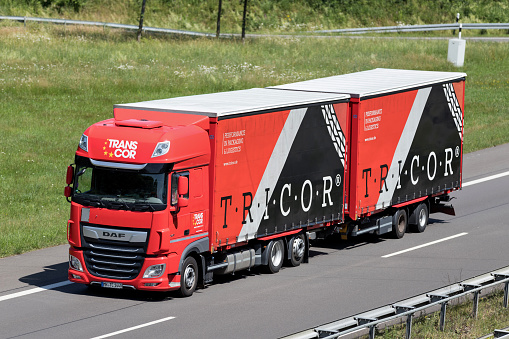 Wiehl, Germany - June 25, 2019: Tricor DAF XF combination truck on motorway
