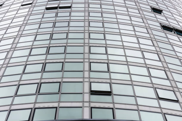istock A circular multi-storey apartment building, with some open windows 1787564485