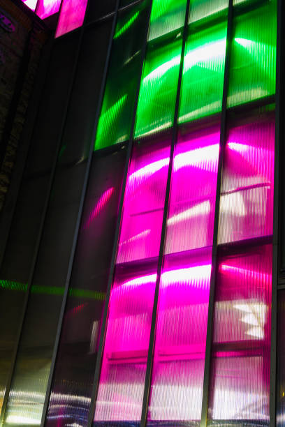 istock Multicoloured lights shining through the windows of a building at night, Ireland 1787564998