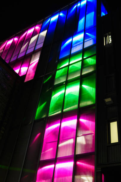 istock Multicoloured lights shining through the windows of a building at night, Ireland 1787565005