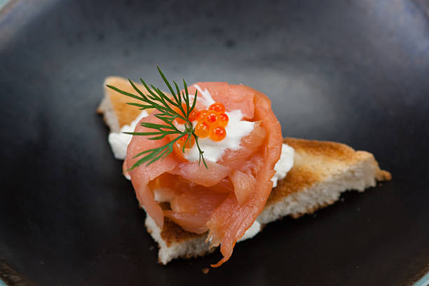 Smoked salmon toast stock photo