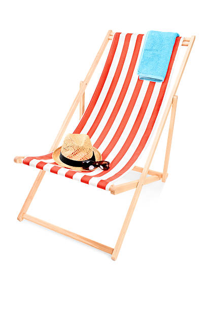 istock Sun lounger with towel, hat and sunglasses 178758099