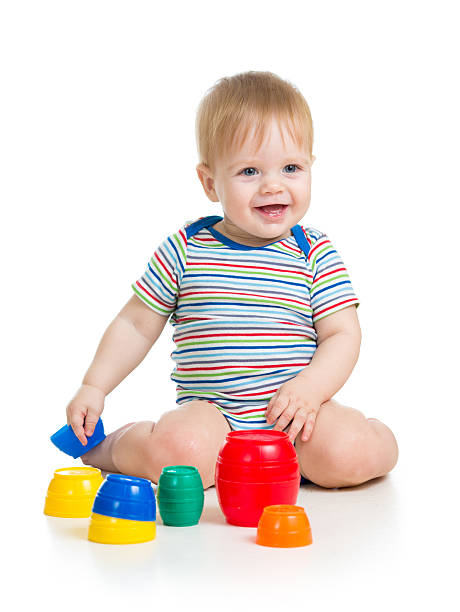 istock baby or kid playing with toys isolated over white 178758522