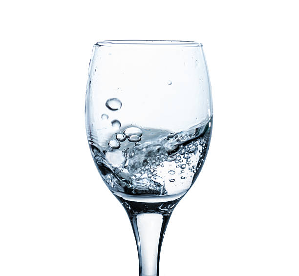 istock Water splash out of glass 178759076