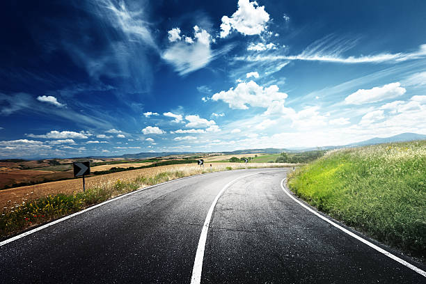 istock asphalt road in Tuscany Italy 178759359
