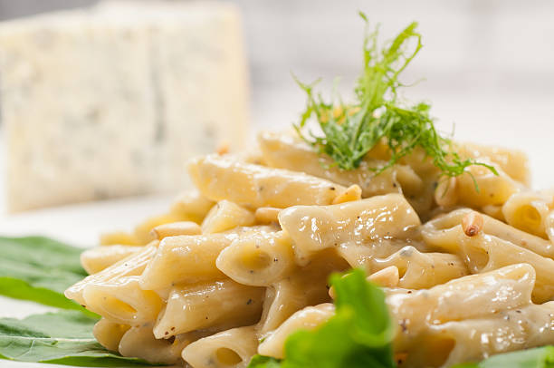 istock Italian pasta penne gorgonzola and pine nuts 178759965