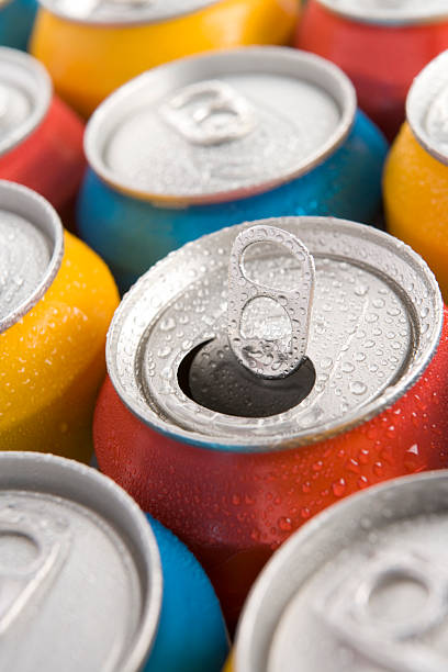 istock Close Up Of Multi Colored Soda Cans With One Open 178760931
