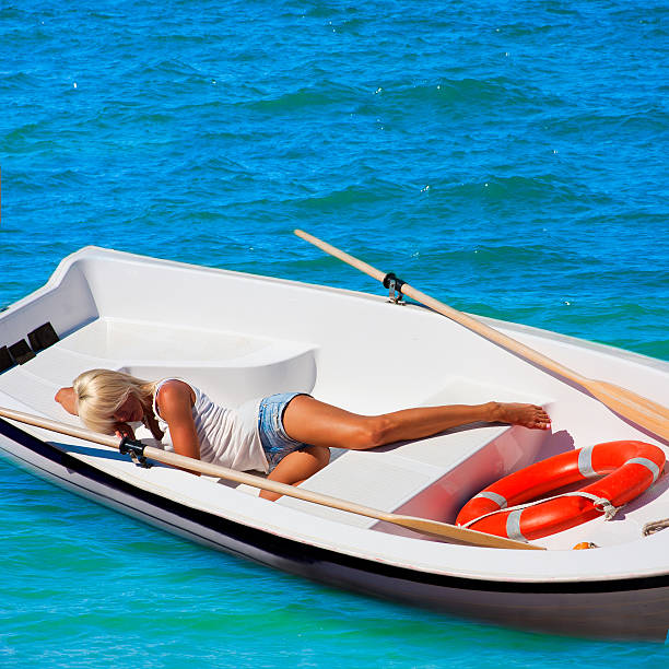 istock woman in a lifeboat. Heat. 178761893