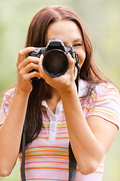 istock Beautiful girl with camera 178762060