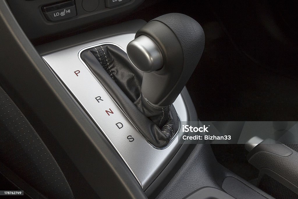 A shift gear knob inside of a vehicle Automatic transmission gear knob Automatic Gearshift Stock Photo