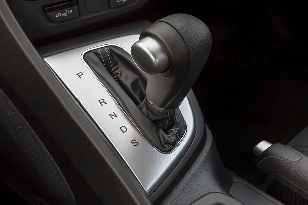 Photo of A shift gear knob inside of a vehicle