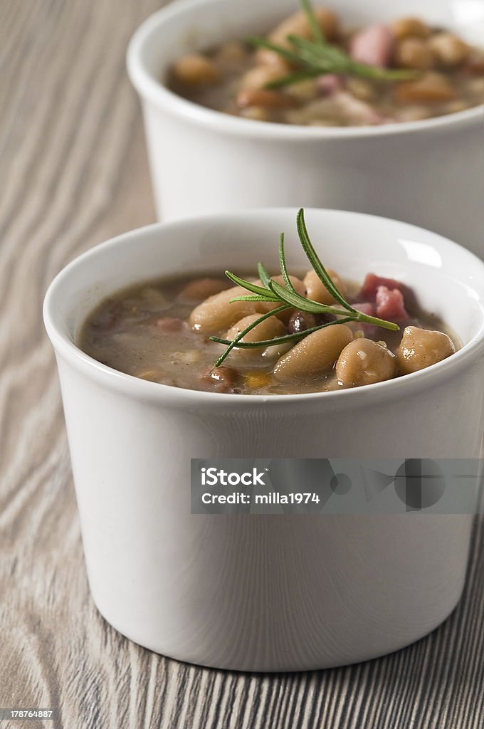 Borlotti bean and spelt soup. Bacon Stock Photo