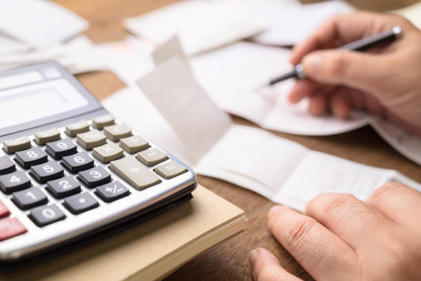istock Man calculates the bills 1787652801