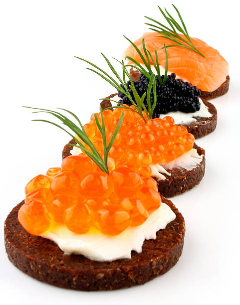 istock Pumpernickel bread with salmon, trout and sturgeon caviar 178765911