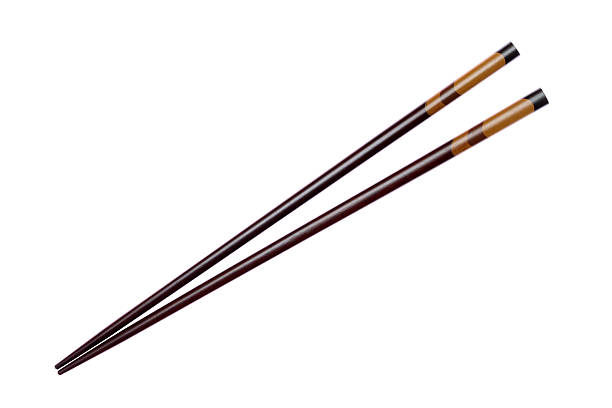 istock Pair of wooden chopsticks isolated on white background 178766098