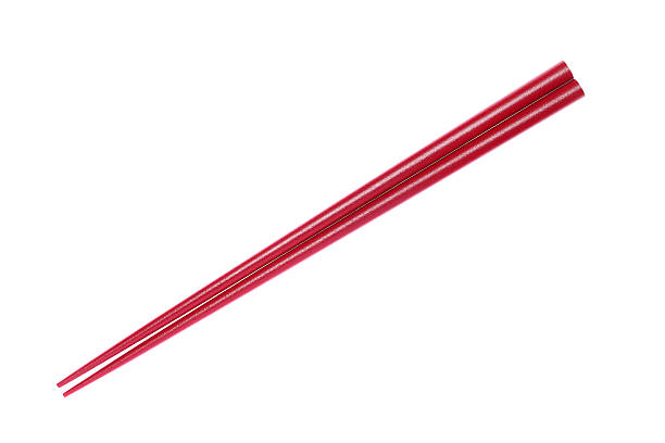 istock Pair of red chopsticks isolated on white background 178766162