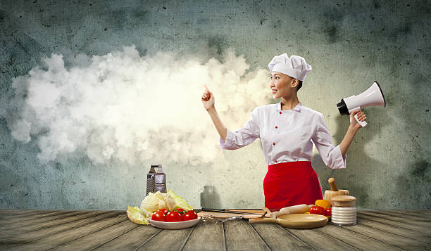 istock Asian female cook holding megaphone 178766860