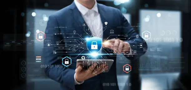 Photo of Cybersecurity and data protection, businessman use secure tablet encryption technology, protect business and financial transaction data from cyber attacks, intelligent protection digital attacks.