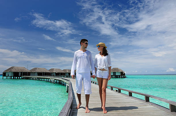 istock Couple on a beach jetty at Maldives 178766958