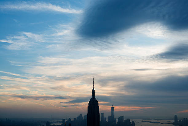 istock The Empire State building emerging above New York's skyline 178767518