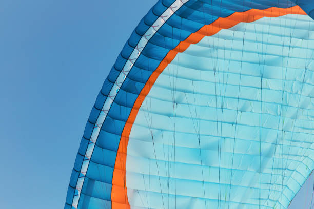 istock Colorful paraglider close-up against the blue sky 1787686155