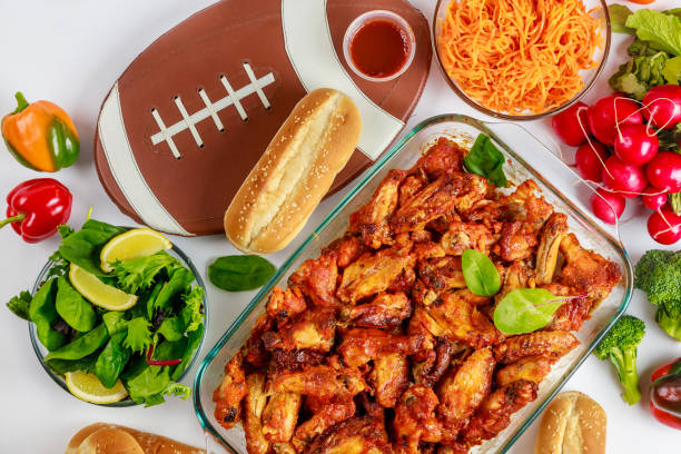 buffalo chicken wings for american football fans watching championship game. - american football football food snack imagens e fotografias de stock