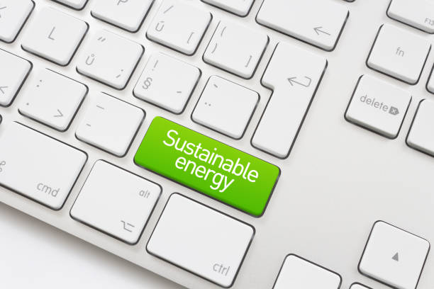 istock Green button on a white keyboard as Sustainable energy concept 1787691075