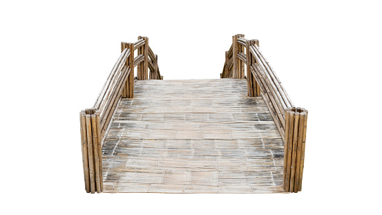 Background and textured of Bridge built from bamboo materials. Curved bridge for crossing small rivers. with clipping path.