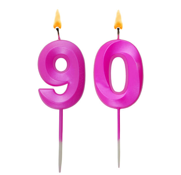 istock Pink birthday candles isolated on white background, number 90 1787693680